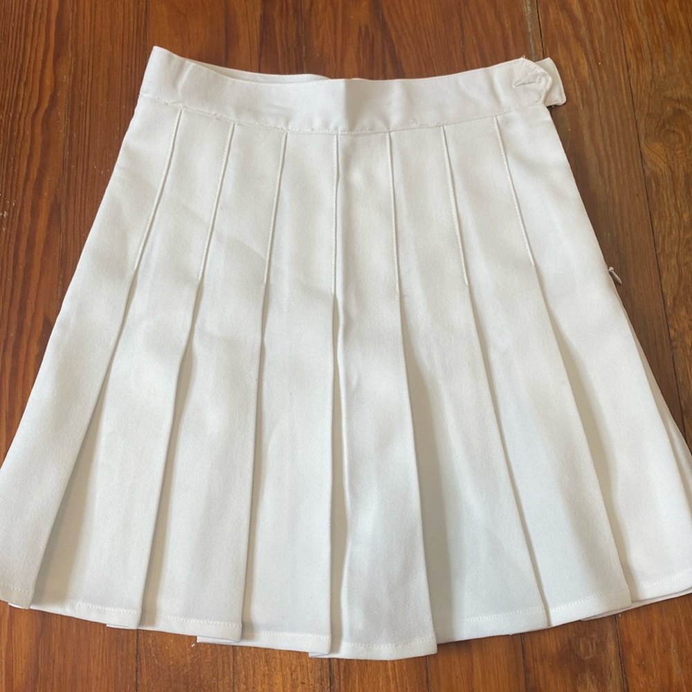White pleated skirt